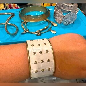 Lot of white, gold and silver bracelets and bangles!